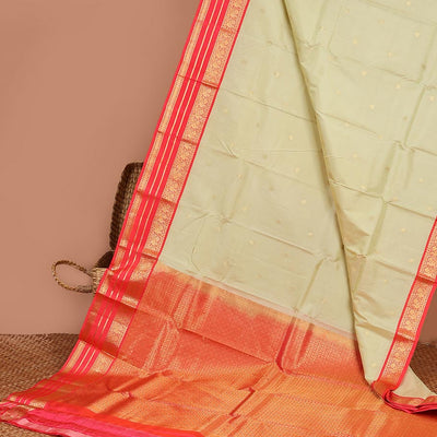 Cream floral buttas silk saree with korvai border of rekku , mayil design & intricate jaal zari design pallu