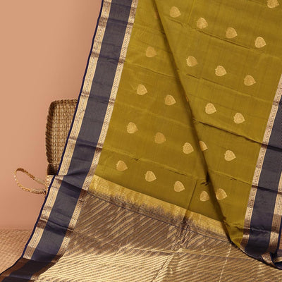 Green butta vasundhara elite silk saree with contrast zari striped border & striped, zari buttas zari design pallu
