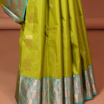 Green floral buttas silk saree with contrast leaf design border &  intricate jaal zari design pallu