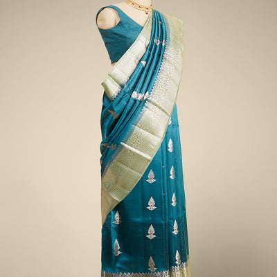 Blue  floral motifs dupion silk saree with contrast zari border