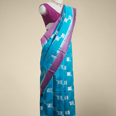 Blue geometric motifs dupion silk saree with contrast plain border