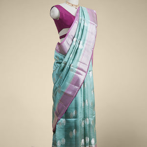 Green  floral motifs dupion silk saree with contrast intricate zari design border