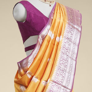 Yellow  floral motifs dupion silk saree with contrast intricate zari design border