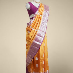 Yellow  floral motifs dupion silk saree with contrast intricate zari design border