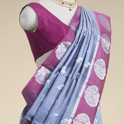 Grey  floral motifs dupion silk saree with contrast round floral motifs zari border Note: slight colour variation of product images due to digital photography or settings on your device