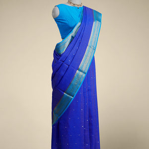 Blue checked with floral motifs mysore silk saree & traditional zari border