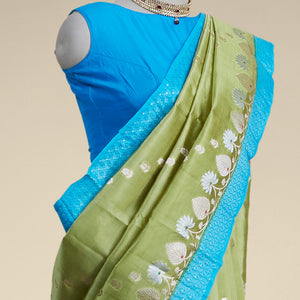 Green floral motifs dupio silk saree with contrast floral embroidery border
