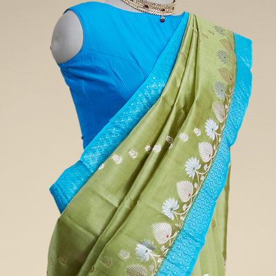 Green floral motifs dupio silk saree with contrast floral embroidery border