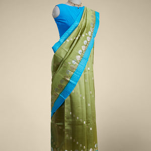 Green floral motifs dupio silk saree with contrast floral embroidery border