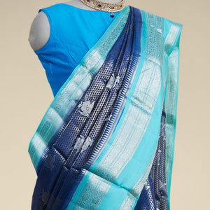 Blue checked with floral motifs dupion silk saree with traditional zari border