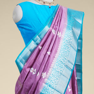 Purple leaf motifs dupion silk saree with intricate zari design border