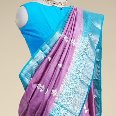 Purple leaf motifs dupion silk saree with intricate zari design border
