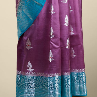 Purple leaf motifs dupion silk saree with intricate zari design border