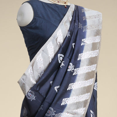 Black leaf motifs dupion silk saree with contrast striped floral zari design border