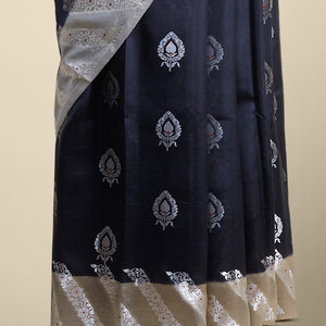 Black leaf motifs dupion silk saree with contrast striped floral zari design border