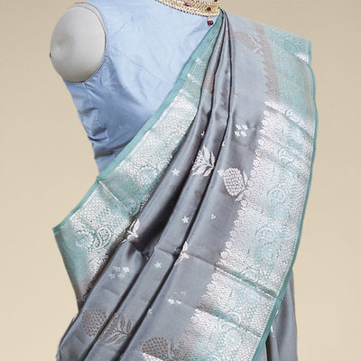 Gery floral motifs dupion silk saree with contrast intricate zari border