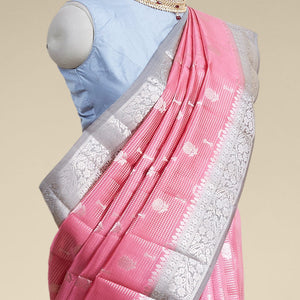 Pink checked with floral motifs dupion silk saree & contrast traditional zari border
