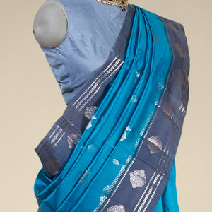 Blue floral motifs dupion silk saree with contast zari design border
