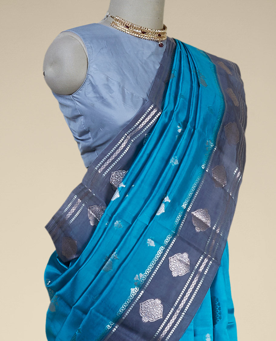 Blue floral motifs dupion silk saree with contast zari design border
