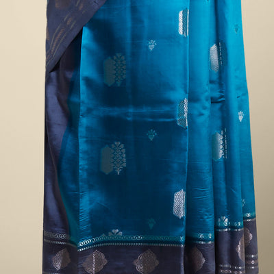 Blue floral motifs dupion silk saree with contast zari design border