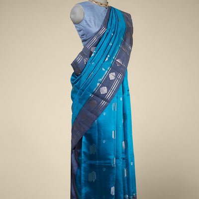 Blue floral motifs dupion silk saree with contast zari design border