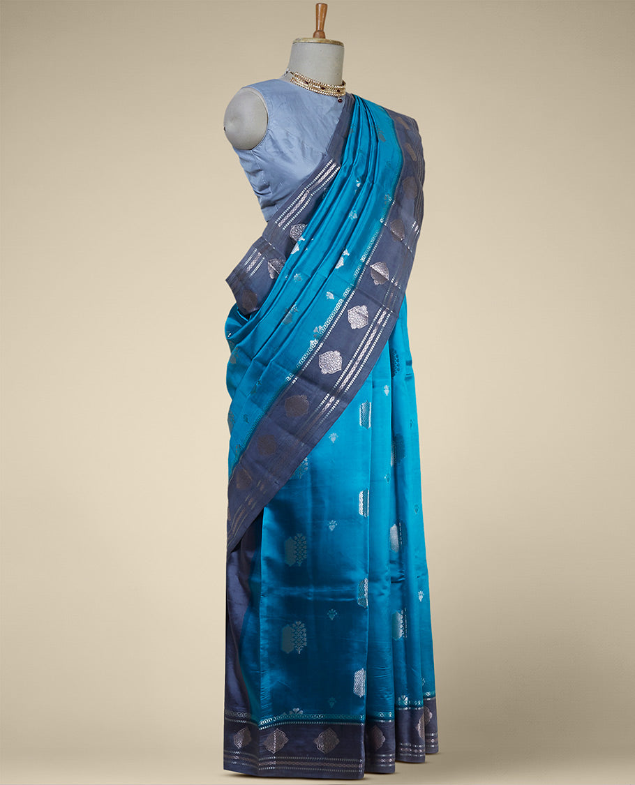 Blue floral motifs dupion silk saree with contast zari design border