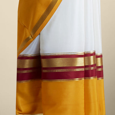 white & yellow mysore silk saree with contrast zair design border