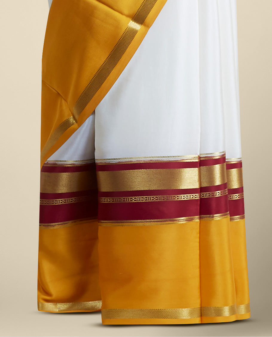white & yellow mysore silk saree with contrast zair design border