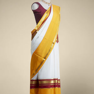 white & yellow mysore silk saree with contrast zair design border
