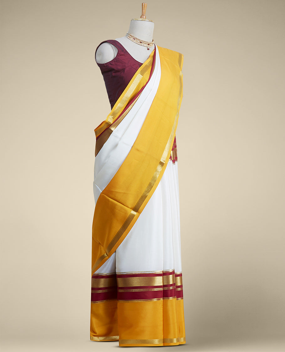 white & yellow mysore silk saree with contrast zair design border