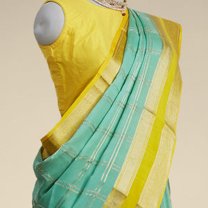 Green checked mysore silk saree with contrast intricate zari border