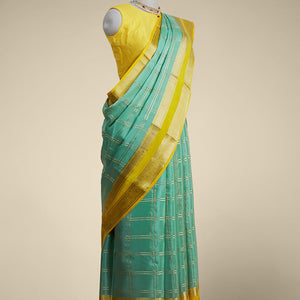 Green checked mysore silk saree with contrast intricate zari border