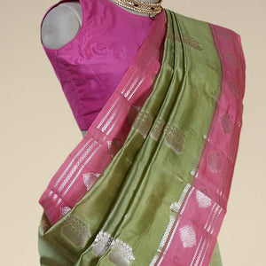 Pink floral motifs dupion silk saree with contrast floral zari border