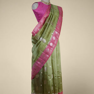 Pink floral motifs dupion silk saree with contrast floral zari border