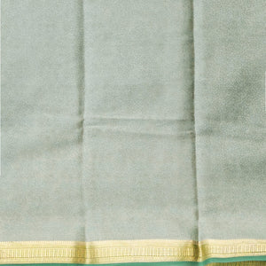 Green floral printed silk saree with contrast zari border