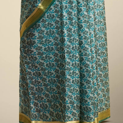 Green floral printed silk saree with contrast zari border