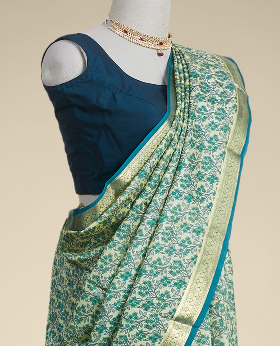 Green floral printed silk saree with contrast zari border