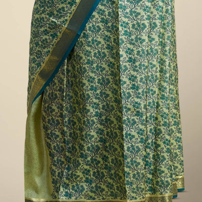 Green floral printed silk saree with contrast zari border