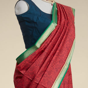 Red floral printed silk saree with contrast zari border