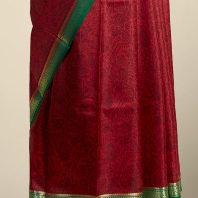 Red floral printed silk saree with contrast zari border