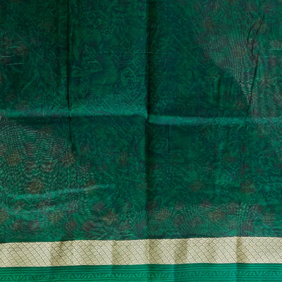 Green geometric printed silk saree with contrast intricate design border