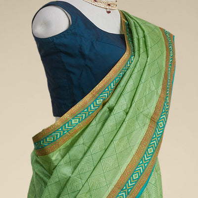 Green geometric printed silk saree with contrast geometric  design border