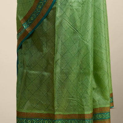 Green geometric printed silk saree with contrast geometric  design border