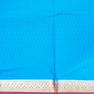 Blue floral printed silk saree with contrast intricate zari design border