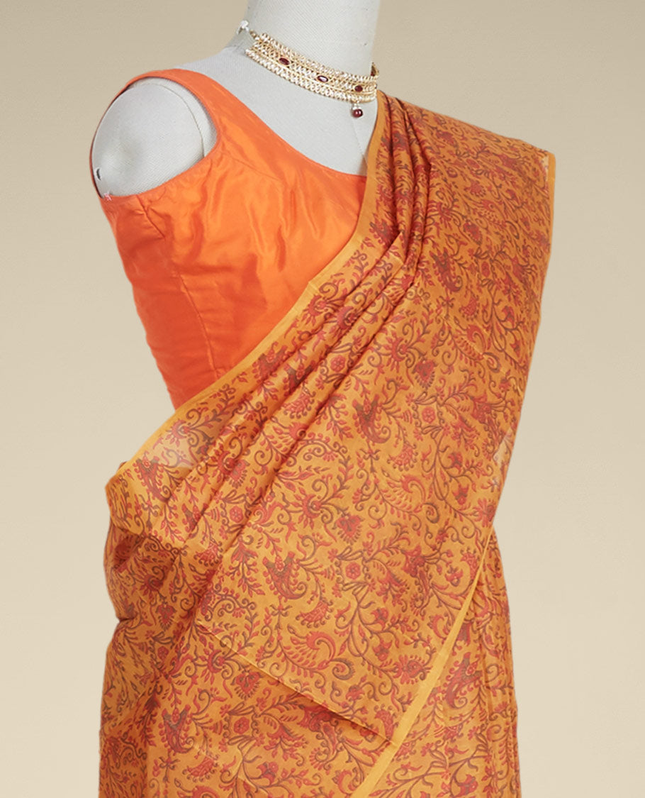 orange floral printed silk saree with contras plain border