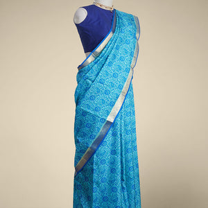 floral , paisleys printed silk saree with contrast intricate zari design border