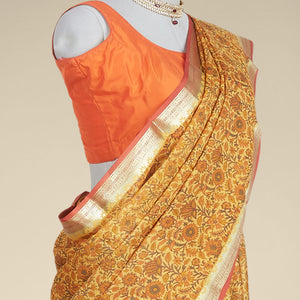 orange  floral printed silk saree with contrast intricate zari design border
