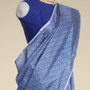 Blue floral design printed silk saree with contrast plain border
