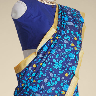 Blue floral vine design printed silk saree with contrast intricate zari border