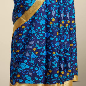 Blue floral vine design printed silk saree with contrast intricate zari border